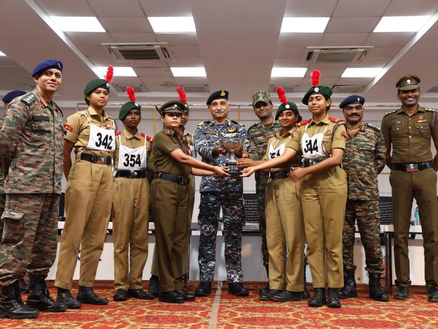 Cadets receiving the overall trophy from the Deputy Director General