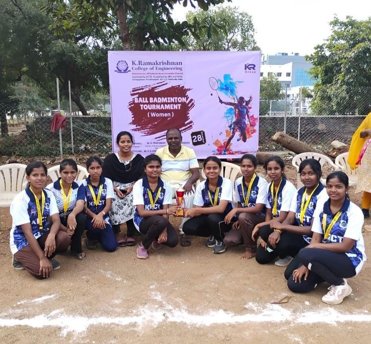 KRCT women's ball badminton team with a trophy