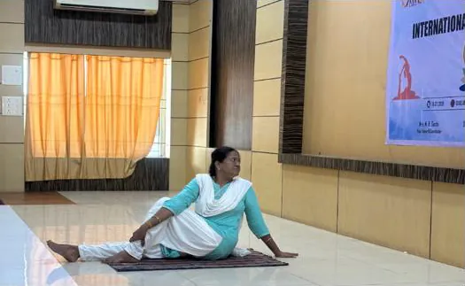 The trainer demonstrating a seated pose