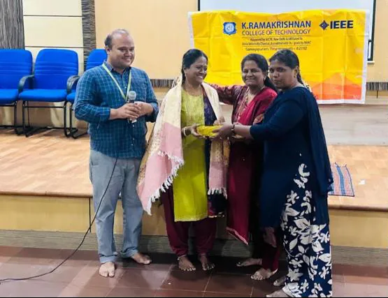 A memento being presented under the IEEE banner