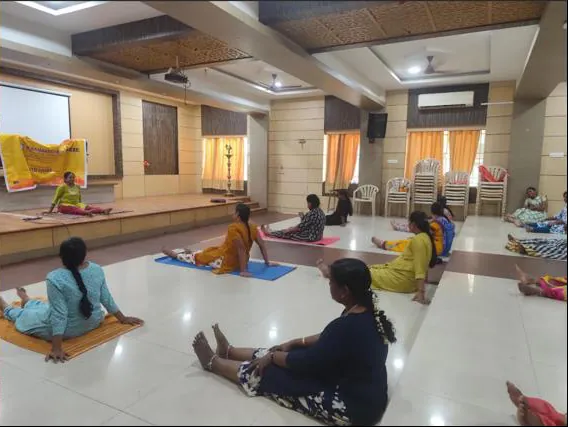 Participants practising on the hall floor