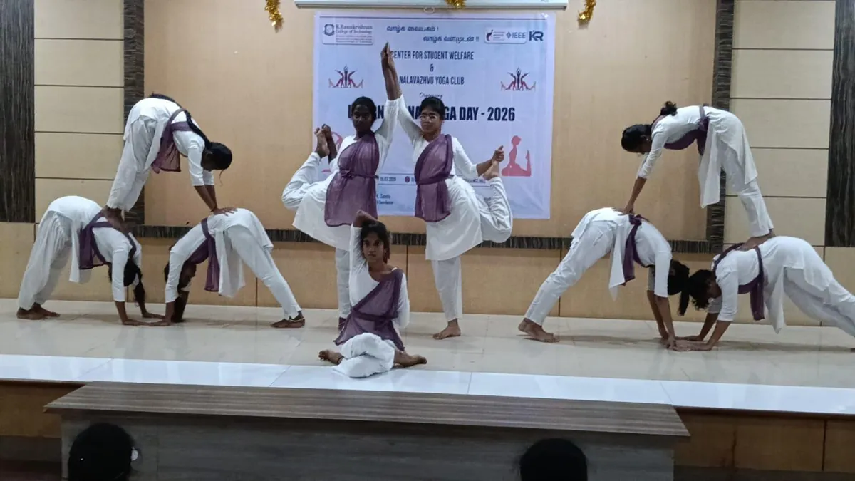 Club members performing a synchronised sequence on stage